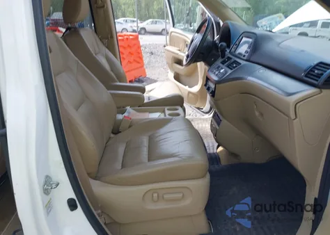 2010 Honda Odyssey Touring z USA, uszkodzony, nr VIN 5FNRL3H90AB039449